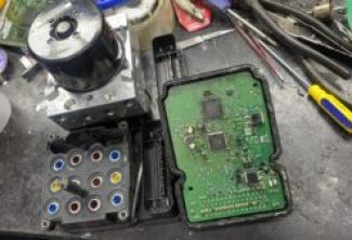 GARAGE CHUYÊN SỬA ABS XE JAGUAR – SỬA BƠM ABS